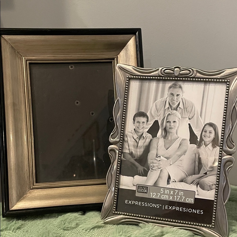 Silver and Black picture frame holds a 5x7 print